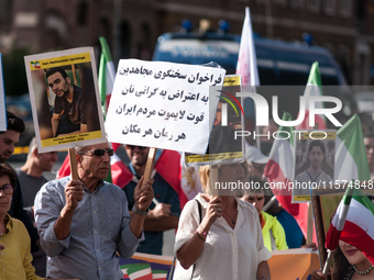 The Association of Iranian Graduates resident in Italy demonstrates on the anniversary of the killing of Mahsa Amini in Iran in Rome, Italy,...