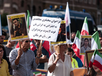 The Association of Iranian Graduates resident in Italy demonstrates on the anniversary of the killing of Mahsa Amini in Iran in Rome, Italy,...