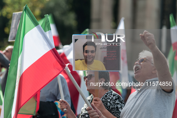 The Association of Iranian Graduates resident in Italy demonstrates on the anniversary of the killing of Mahsa Amini in Iran in Rome, Italy,...