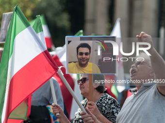 The Association of Iranian Graduates resident in Italy demonstrates on the anniversary of the killing of Mahsa Amini in Iran in Rome, Italy,...