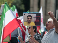 The Association of Iranian Graduates resident in Italy demonstrates on the anniversary of the killing of Mahsa Amini in Iran in Rome, Italy,...