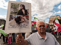 The Association of Iranian Graduates resident in Italy demonstrates on the anniversary of the killing of Mahsa Amini in Iran in Rome, Italy,...