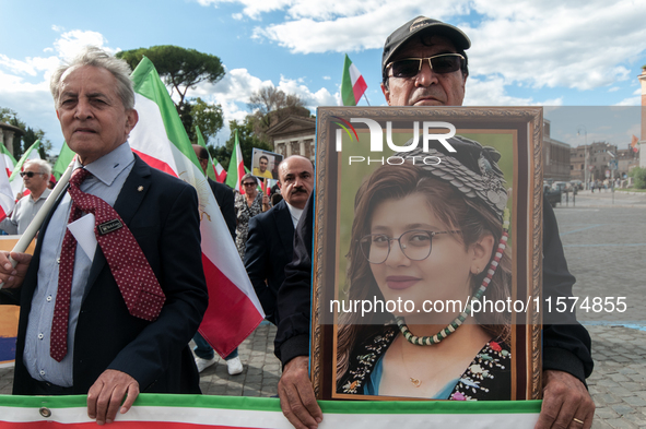 The Association of Iranian Graduates resident in Italy demonstrates on the anniversary of the killing of Mahsa Amini in Iran in Rome, Italy,...