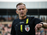 Referee Piotr Lasyk officiates the game between KS Cracovia and Pogon Szczecin in Krakow, Poland, on September 14, 2024. PKO BP Ekstraklasa,...