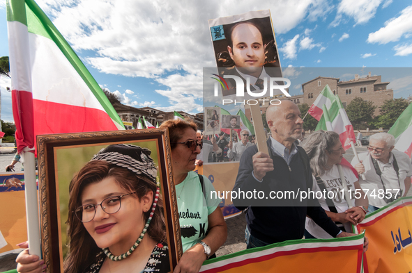 The Association of Iranian Graduates resident in Italy demonstrates on the anniversary of the killing of Mahsa Amini in Iran in Rome, Italy,...