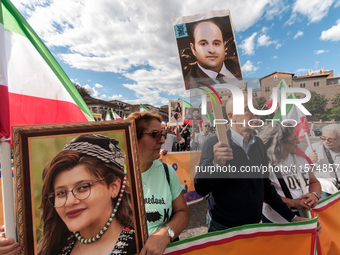 The Association of Iranian Graduates resident in Italy demonstrates on the anniversary of the killing of Mahsa Amini in Iran in Rome, Italy,...