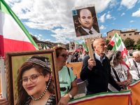 The Association of Iranian Graduates resident in Italy demonstrates on the anniversary of the killing of Mahsa Amini in Iran in Rome, Italy,...