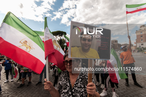 The Association of Iranian Graduates resident in Italy demonstrates on the anniversary of the killing of Mahsa Amini in Iran in Rome, Italy,...