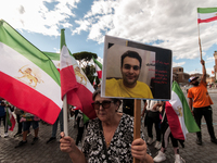 The Association of Iranian Graduates resident in Italy demonstrates on the anniversary of the killing of Mahsa Amini in Iran in Rome, Italy,...