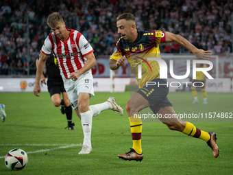 Kamil Grosicki and Jakub Jugas play during the game between KS Cracovia and Pogon Szczecin in Krakow, Poland, on September 14, 2024. PKO BP...