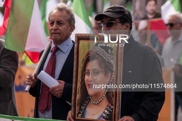 The Association of Iranian Graduates resident in Italy demonstrates on the anniversary of the killing of Mahsa Amini in Iran in Rome, Italy,...