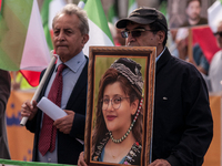 The Association of Iranian Graduates resident in Italy demonstrates on the anniversary of the killing of Mahsa Amini in Iran in Rome, Italy,...