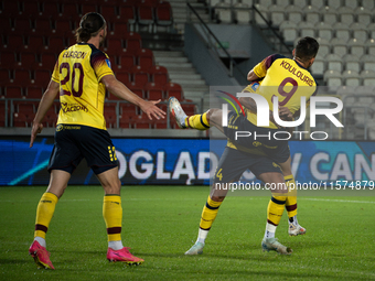 Alexander Gorgon and Efthymios Koulouris during the game between KS Cracovia and Pogon Szczecin in Krakow, Poland, on September 14, 2024. PK...