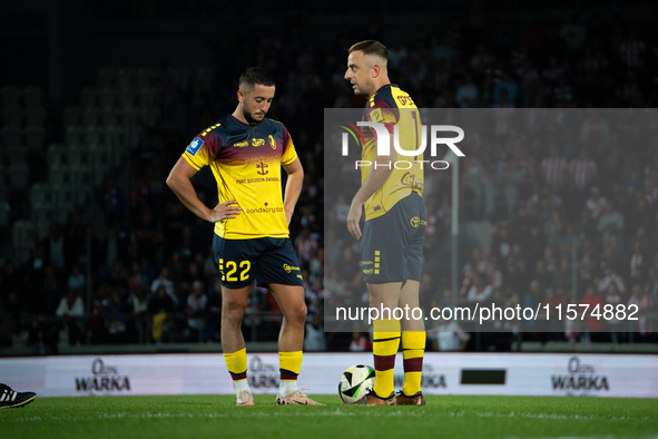 Vahan Bichakhchyan and Kamil Grosicki play during the game between KS Cracovia and Pogon Szczecin in Krakow, Poland, on September 14, 2024....