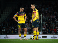 Vahan Bichakhchyan and Kamil Grosicki play during the game between KS Cracovia and Pogon Szczecin in Krakow, Poland, on September 14, 2024....