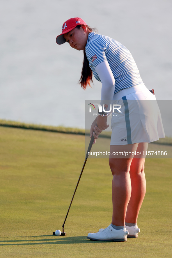 GAINESVILLE, VIRGINIA - SEPTEMBER 14: Allisen Corpuz of the United States prepares to putt on the 18th green during Day Two of the Solheim C...