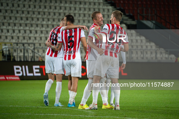 Cracovia players celebrate scoring a goal during the game between KS Cracovia and Pogon Szczecin in Krakow, Poland, on September 14, 2024. P...