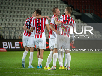 Cracovia players celebrate scoring a goal during the game between KS Cracovia and Pogon Szczecin in Krakow, Poland, on September 14, 2024. P...