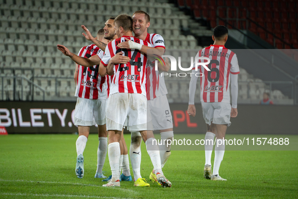 Cracovia players celebrate scoring a goal during the game between KS Cracovia and Pogon Szczecin in Krakow, Poland, on September 14, 2024. P...