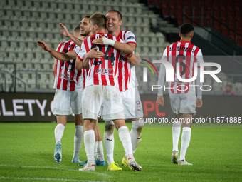 Cracovia players celebrate scoring a goal during the game between KS Cracovia and Pogon Szczecin in Krakow, Poland, on September 14, 2024. P...