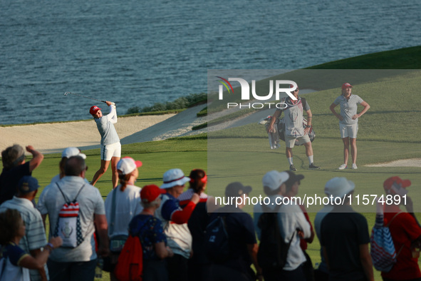 GAINESVILLE, VIRGINIA - SEPTEMBER 14: Ally Ewing of the United States plays her shot toward the 17th green during Fourball Matches on Day Tw...