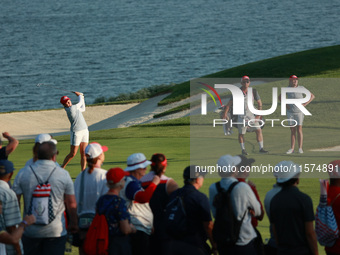 GAINESVILLE, VIRGINIA - SEPTEMBER 14: Ally Ewing of the United States plays her shot toward the 17th green during Fourball Matches on Day Tw...