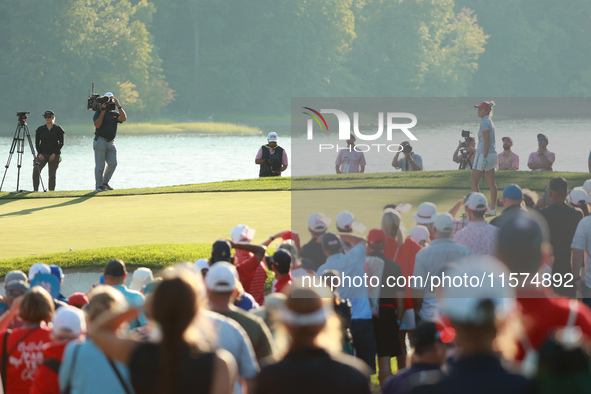 GAINESVILLE, VIRGINIA - SEPTEMBER 14: Lexi Thompson of the United States reacts to her putt on the 17th green during Fourball Matches on Day...