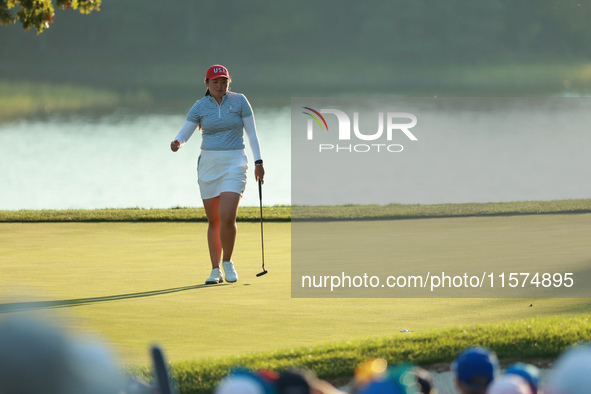 GAINESVILLE, VIRGINIA - SEPTEMBER 14: Allisen Corpuz of the United States follows her putt on the 17th green during Fourball Matches on Day...