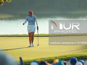 GAINESVILLE, VIRGINIA - SEPTEMBER 14: Allisen Corpuz of the United States follows her putt on the 17th green during Fourball Matches on Day...