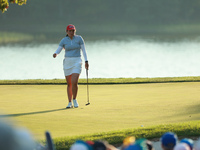 GAINESVILLE, VIRGINIA - SEPTEMBER 14: Allisen Corpuz of the United States follows her putt on the 17th green during Fourball Matches on Day...