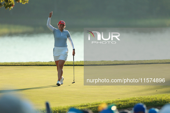 GAINESVILLE, VIRGINIA - SEPTEMBER 14: Allisen Corpuz of the United States reacts to her putt on the 17th green during Fourball Matches on Da...