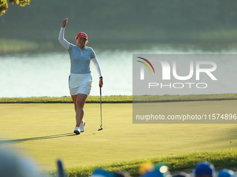 GAINESVILLE, VIRGINIA - SEPTEMBER 14: Allisen Corpuz of the United States reacts to her putt on the 17th green during Fourball Matches on Da...