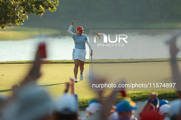 GAINESVILLE, VIRGINIA - SEPTEMBER 14: Allisen Corpuz of the United States reacts to her putt on the 17th green during Fourball Matches on Da...