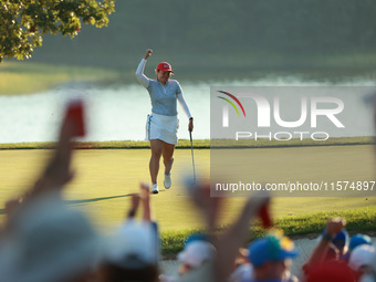 GAINESVILLE, VIRGINIA - SEPTEMBER 14: Allisen Corpuz of the United States reacts to her putt on the 17th green during Fourball Matches on Da...