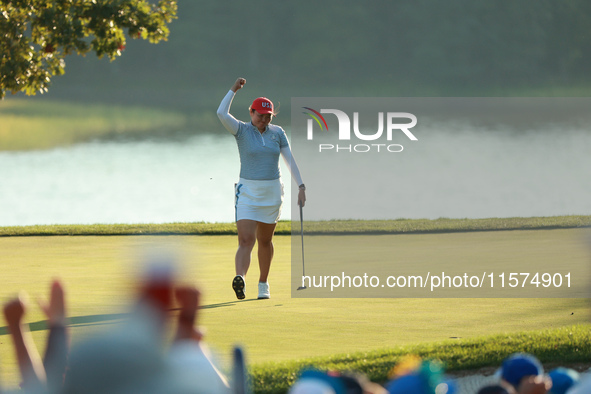 GAINESVILLE, VIRGINIA - SEPTEMBER 14: Allisen Corpuz of the United States reacts to her putt on the 17th green during Fourball Matches on Da...