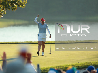 GAINESVILLE, VIRGINIA - SEPTEMBER 14: Allisen Corpuz of the United States reacts to her putt on the 17th green during Fourball Matches on Da...