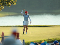 GAINESVILLE, VIRGINIA - SEPTEMBER 14: Allisen Corpuz of the United States reacts to her putt on the 17th green during Fourball Matches on Da...