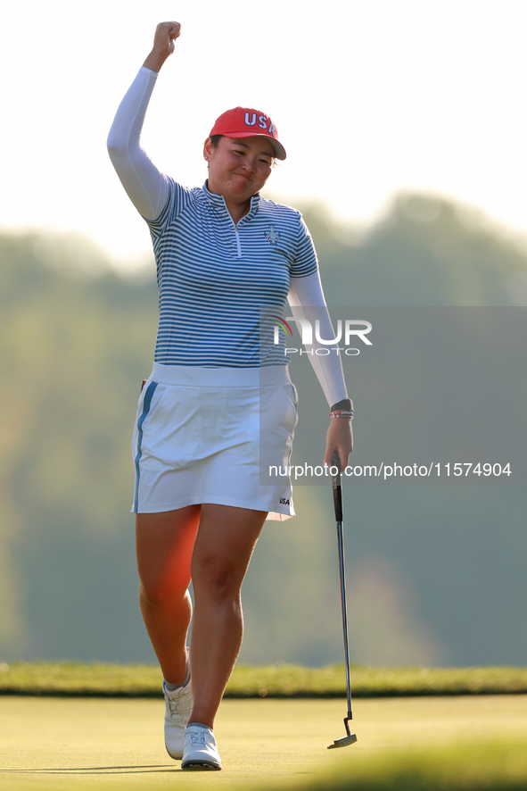 GAINESVILLE, VIRGINIA - SEPTEMBER 14: Allisen Corpuz of the United States reacts to her putt on the 17th green during Day Two of the Solheim...