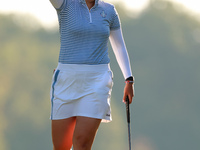 GAINESVILLE, VIRGINIA - SEPTEMBER 14: Allisen Corpuz of the United States reacts to her putt on the 17th green during Day Two of the Solheim...