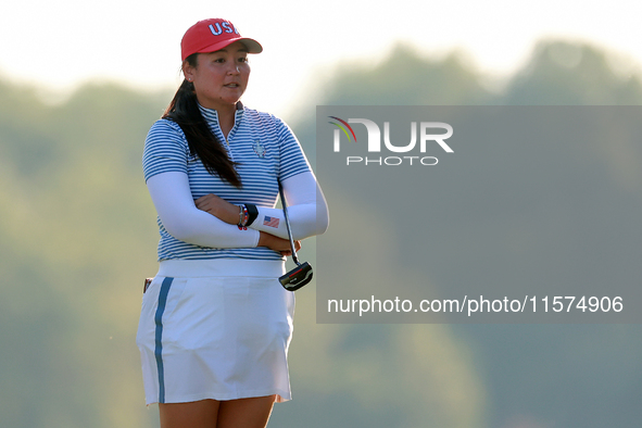 GAINESVILLE, VIRGINIA - SEPTEMBER 14: Allisen Corpuz of the United States waits on the 17th green during Day Two of the Solheim Cup at Rober...