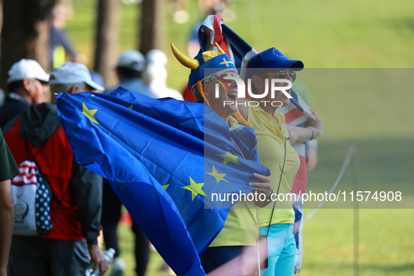 GAINESVILLE, VIRGINIA - SEPTEMBER 14: Fans cheer for Team Europe during Foursomes Matches on Day Two of the Solheim Cup at Robert Trent Jone...