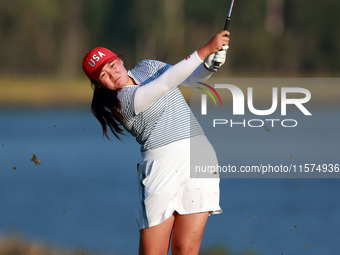 GAINESVILLE, VIRGINIA - SEPTEMBER 14: Allisen Corpuz of the United States hits to the 17th green during Day Two of the Solheim Cup at Robert...