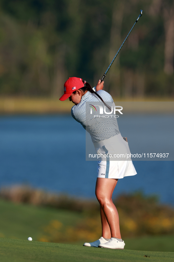 GAINESVILLE, VIRGINIA - SEPTEMBER 14: Allisen Corpuz of the United States hits to the 17th green during Day Two of the Solheim Cup at Robert...