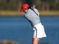 GAINESVILLE, VIRGINIA - SEPTEMBER 14: Allisen Corpuz of the United States hits to the 17th green during Day Two of the Solheim Cup at Robert...