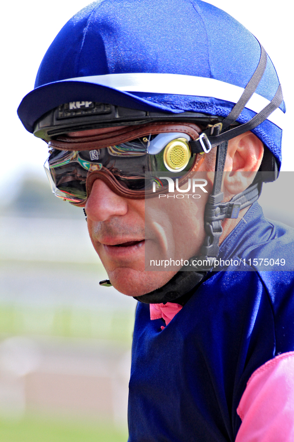 Jockey Frankie Dettori heads to the winner's circle after riding Rhaenys to a win in the third race at Woodbine Racetrack in Toronto, Canada...