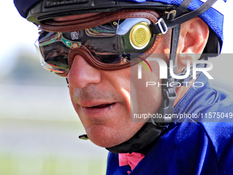 Jockey Frankie Dettori heads to the winner's circle after riding Rhaenys to a win in the third race at Woodbine Racetrack in Toronto, Canada...