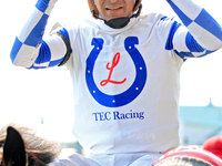 Jockey Rafael Hernandez heads to the winner's circle after riding Whisper Not to a win in the fourth race at Woodbine Racetrack in Toronto,...