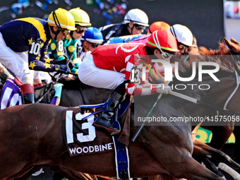 Jockey Kazushi Kimura (13) rides Ro Town at the beginning of the Ontario Matron Stakes (Grade III) at Woodbine Racetrack in Toronto, Canada,...