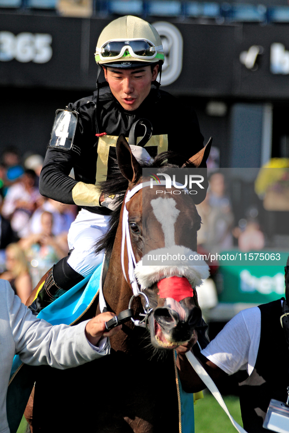 Jockey Kazushi Kimura rides Full Count Felicia to the winner's circle following a win in the E.P. Taylor Stakes (Grade I) at Woodbine Racetr...