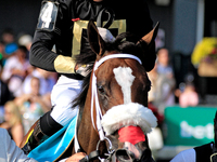 Jockey Kazushi Kimura rides Full Count Felicia to the winner's circle following a win in the E.P. Taylor Stakes (Grade I) at Woodbine Racetr...